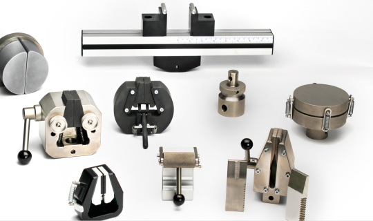 Mecmesin - Selection of grips and fixtures for product, component and specimen quality control testing